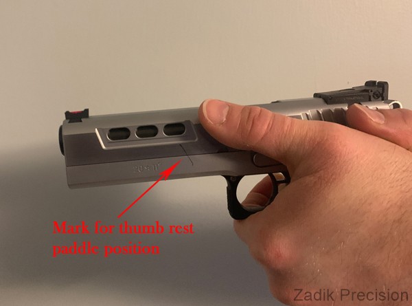 Thumb angle mark on dust cover for placement.